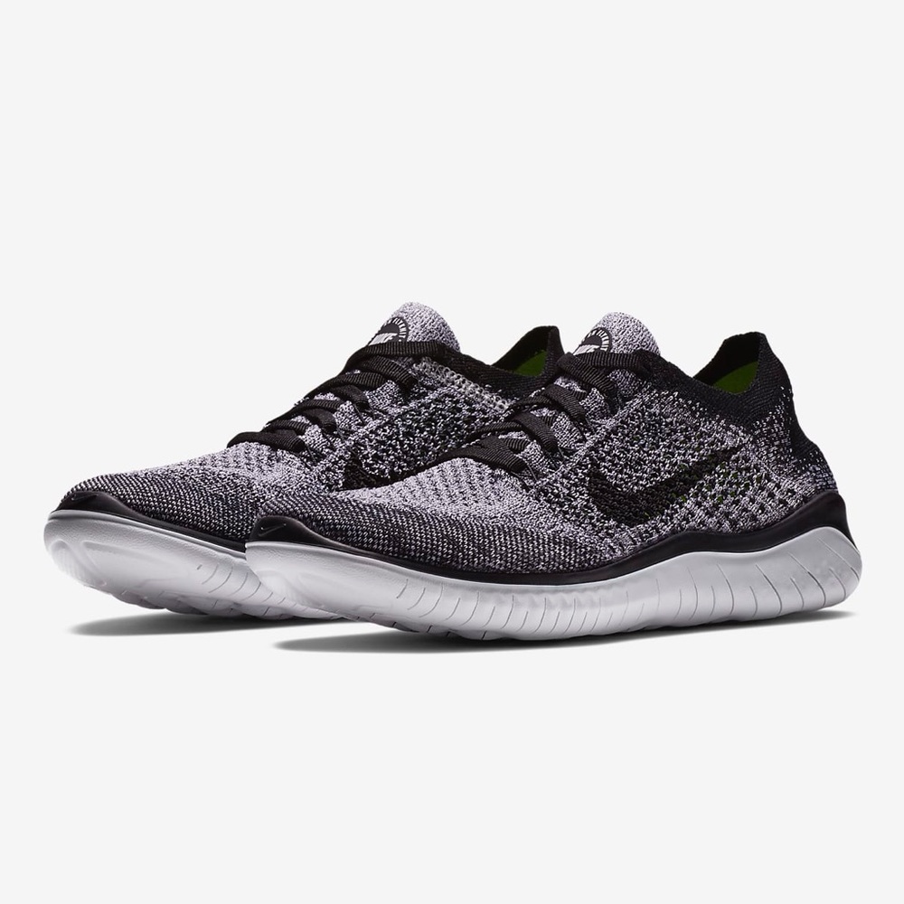 Nike Women's Black and White Flyknit Running Shoes